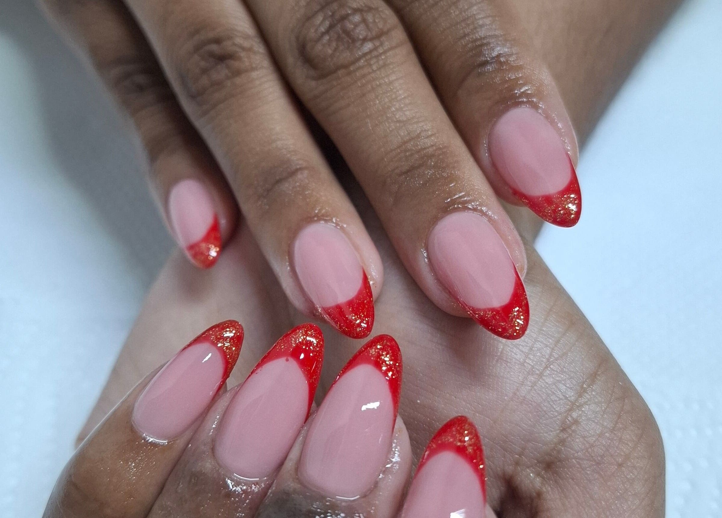 Stylish red-tipped nails at House of Nails, Cape Town, Western Cape, ZA.
