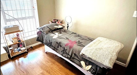 Cozy treatment room at Make Me Pretti‎ in Cape Town, Western Cape, ZA with a well-prepared massage table.
