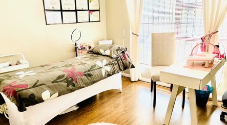 Peaceful treatment room at Make Me Pretti‎, Cape Town, Western Cape, ZA, with floral bedspread and natural light.