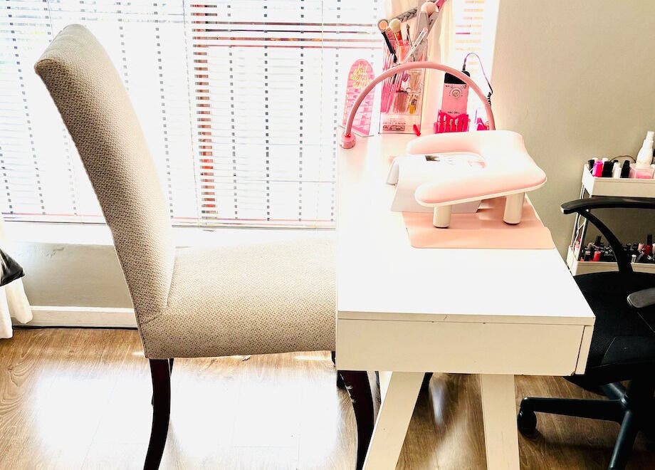 Elegant beauty station at Make Me Pretti‎, Cape Town, Western Cape, ZA with nail accessories and comfy chairs.