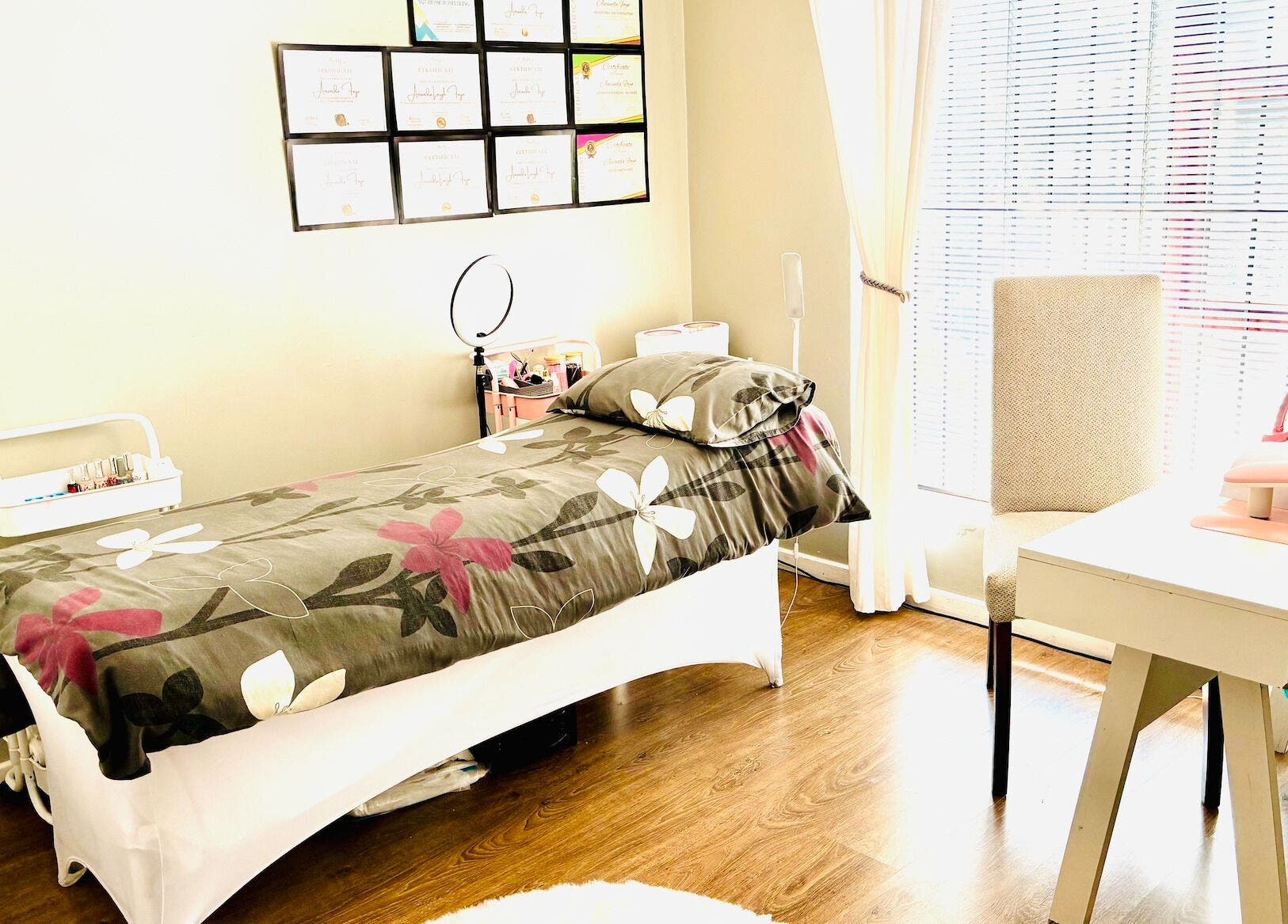 Make Me Pretti‎ beauty room in Cape Town, Western Cape, ZA with floral bedspread and bright sunlight.