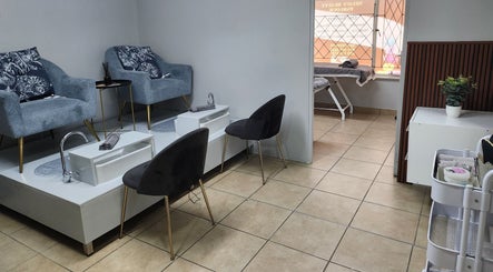 Elegant interior of Nelos Beauty Parlour in Mbombela, Mpumalanga, ZA featuring deluxe pedicure stations.