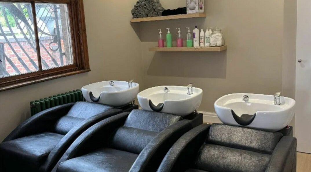 Sophisticated wash stations at Salon387, Stockport, England, GB, enhancing hair care experience.