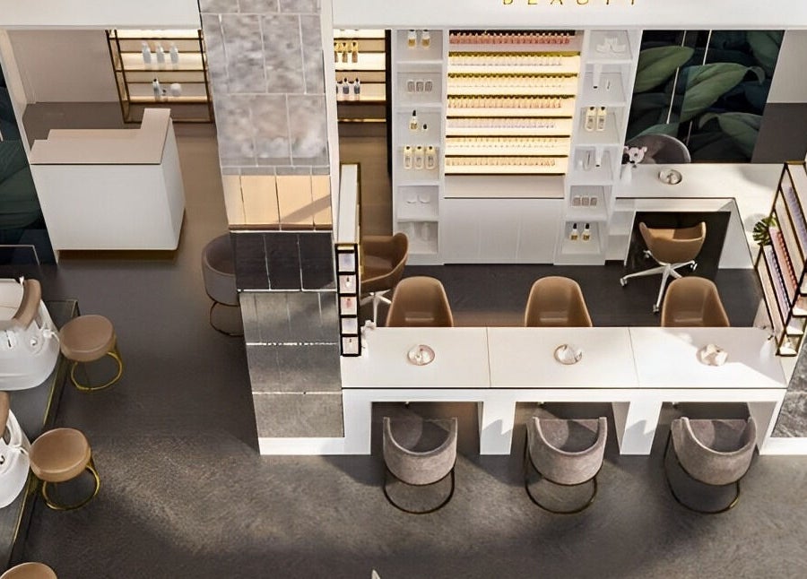 Inside Icon Nails & Beauty, Zürich: elegant salon with plush chairs and modern decor for a luxurious experience.