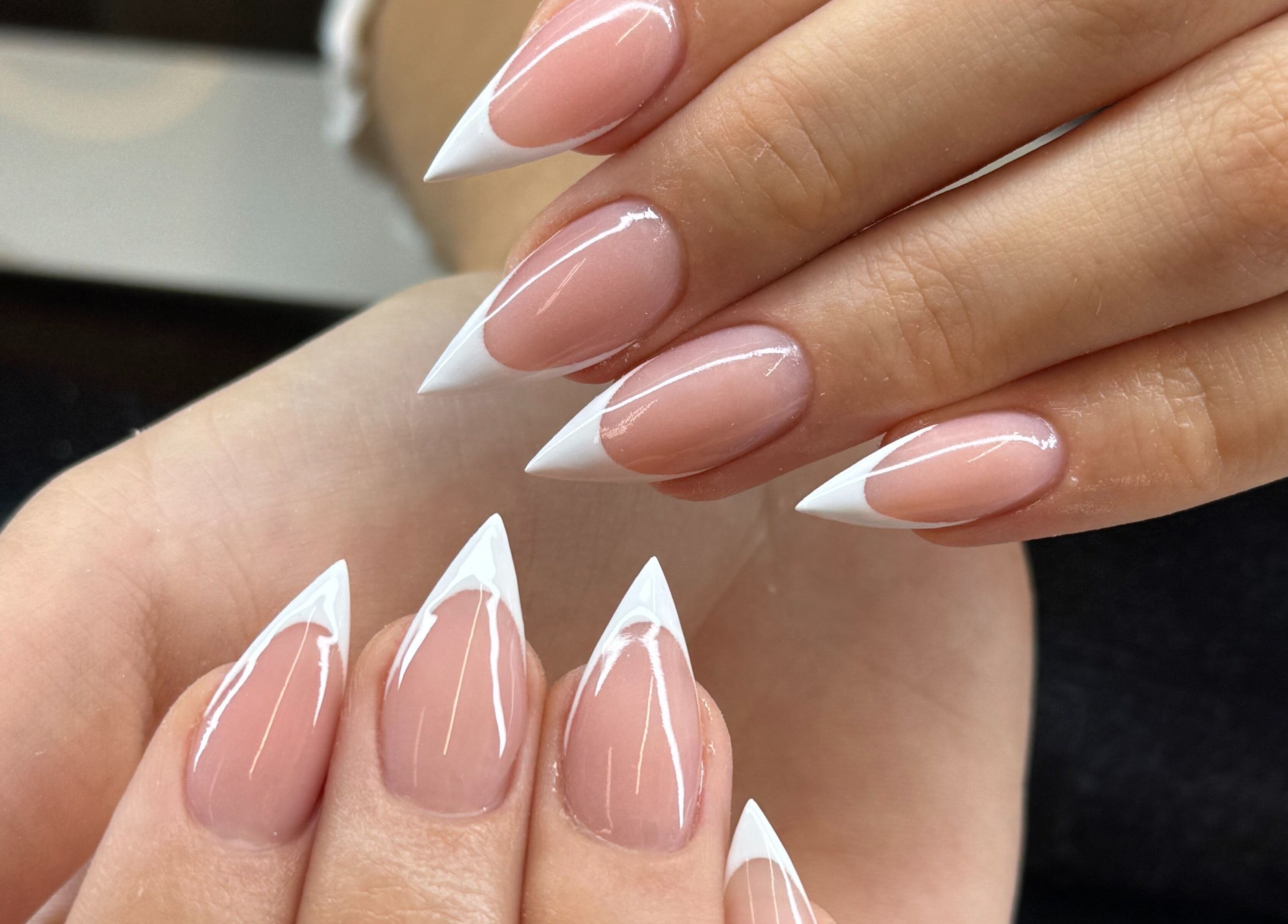 Stylish French tip nails at Icon Nails & Beauty, Zürich, Zürich, CH, showcasing elegant nail art design.