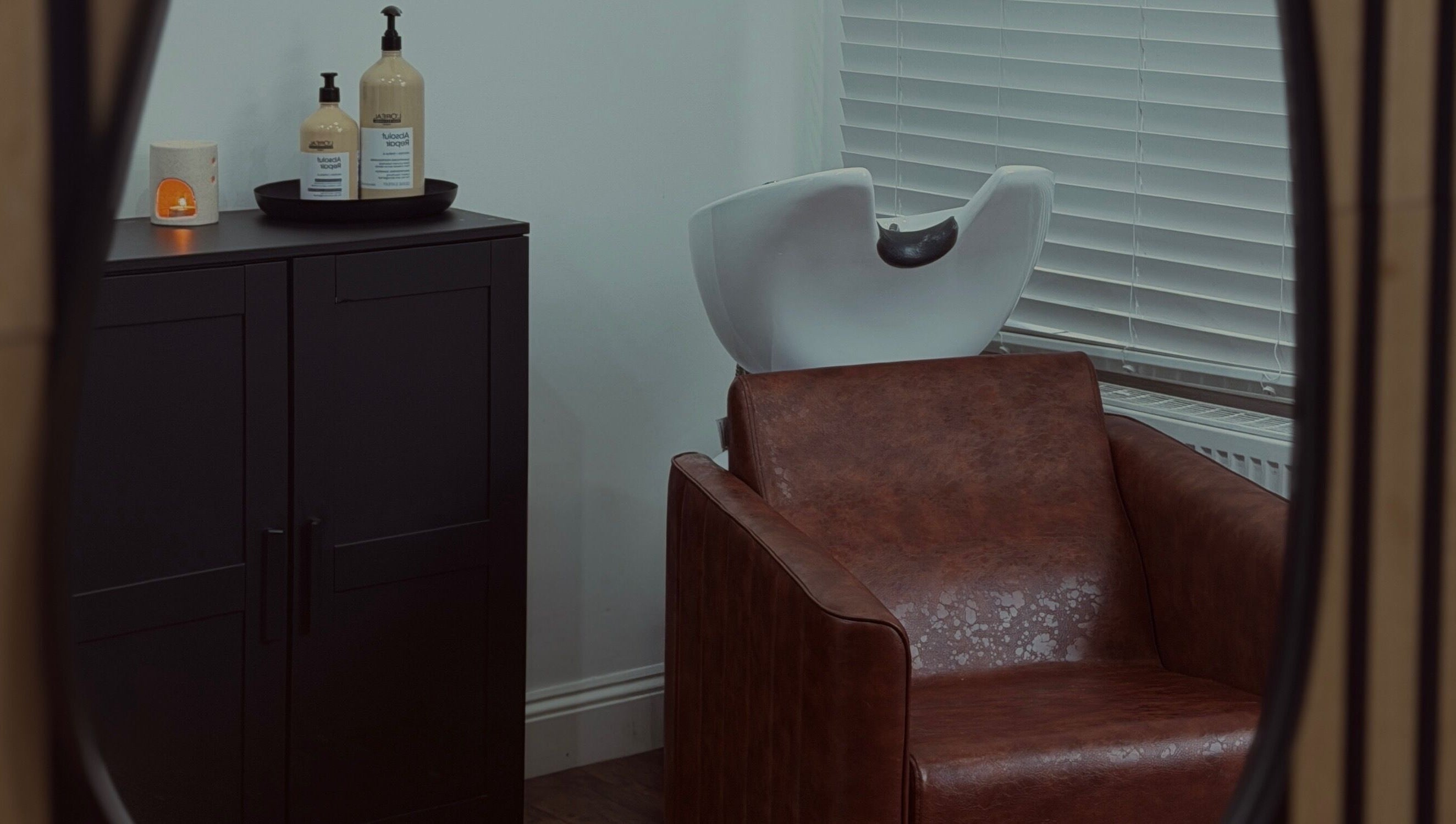 Elegant hair wash station at MS Hairdressing, Colchester, England, GB offering a relaxing salon experience.