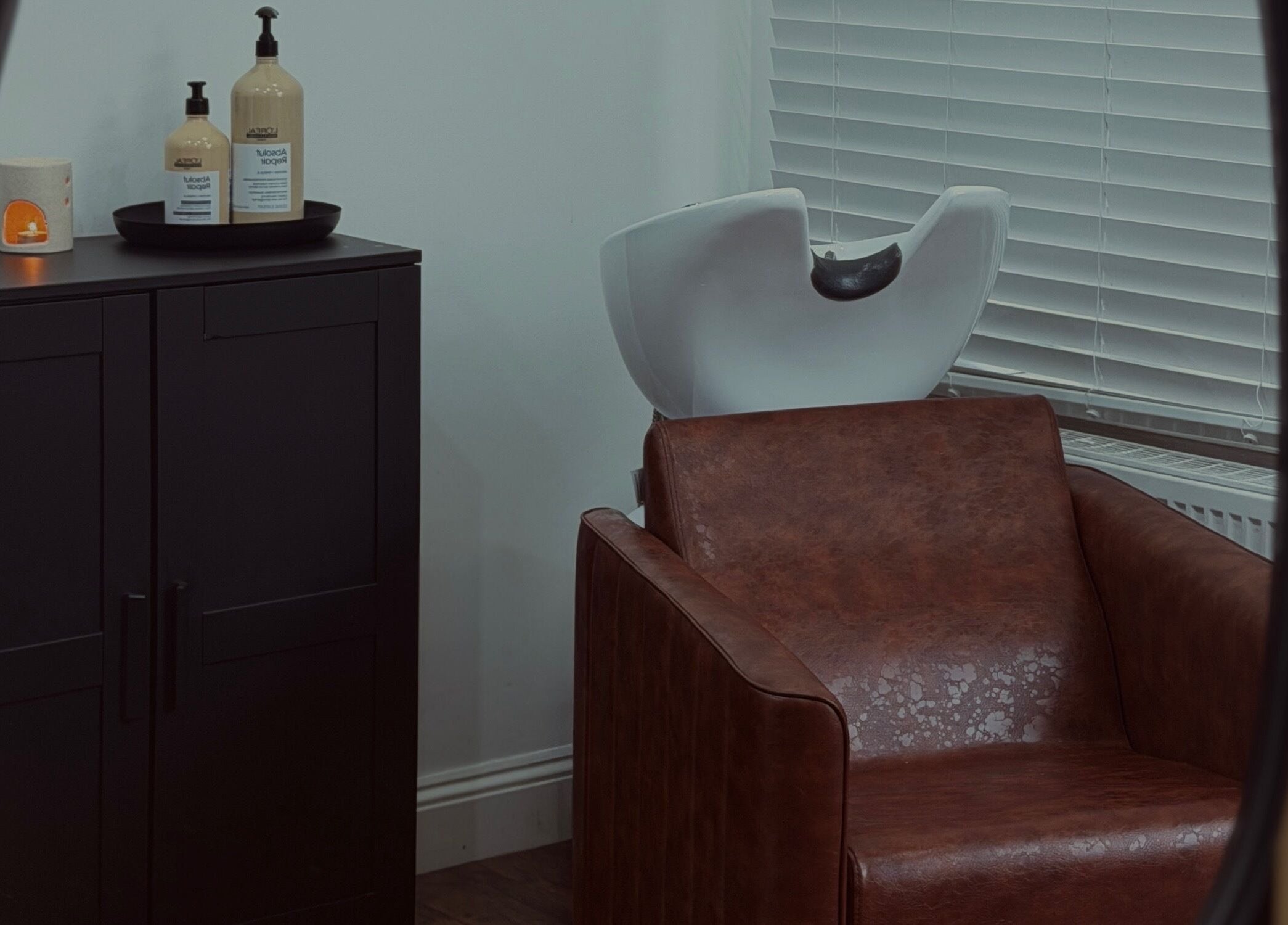 Elegant hair wash station at MS Hairdressing, Colchester, England, GB offering a relaxing salon experience.