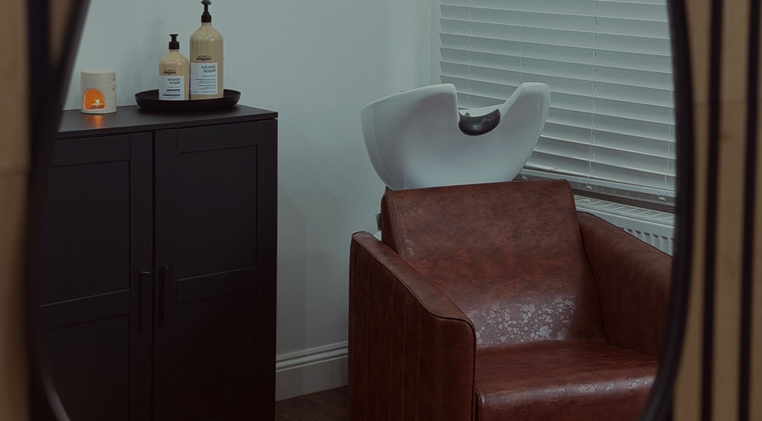 Elegant hair wash station at MS Hairdressing, Colchester, England, GB offering a relaxing salon experience.