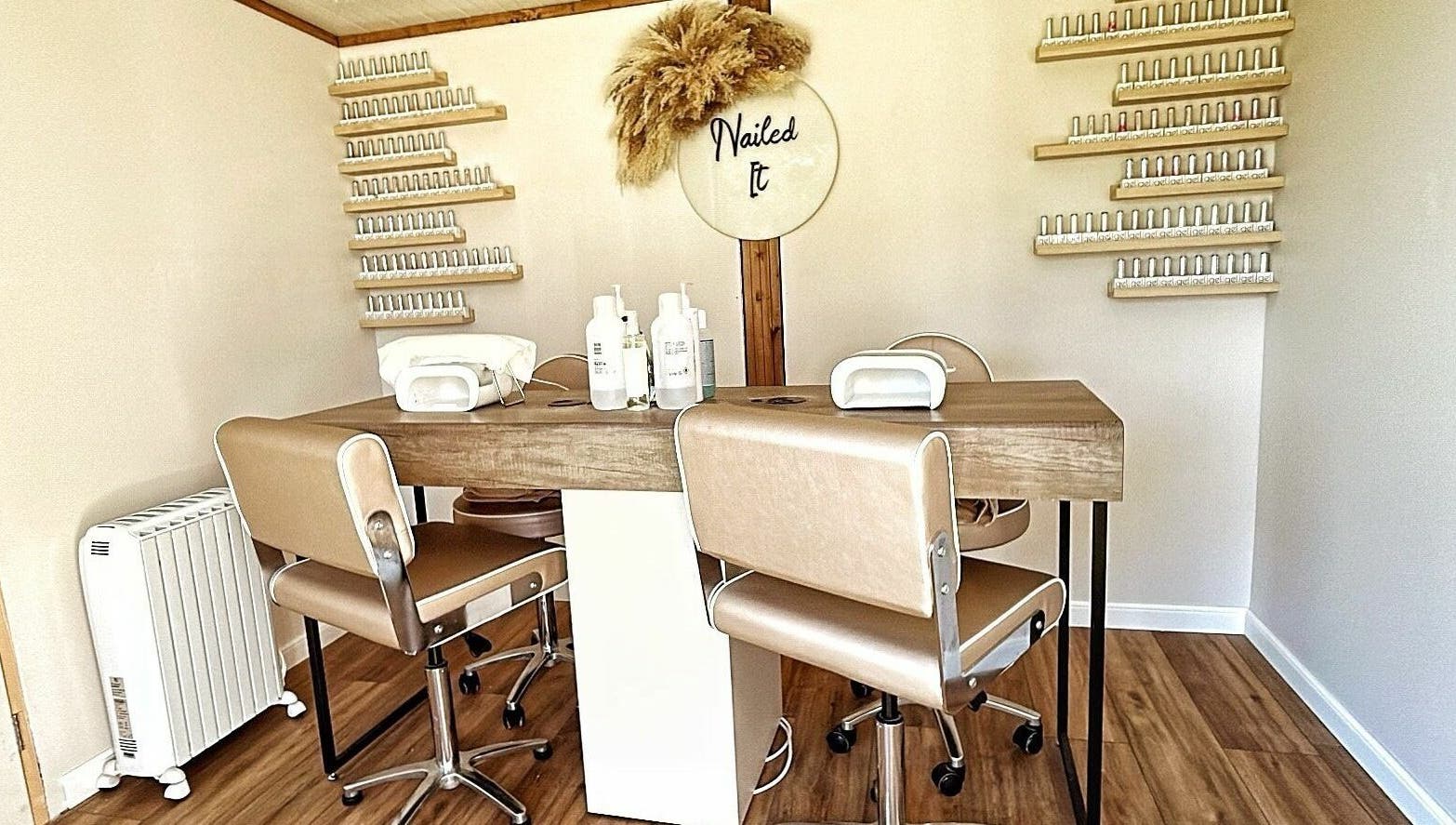 Elegant nail salon setup at The Cabin in Cossall, England, GB, featuring stylish chairs and nail products.