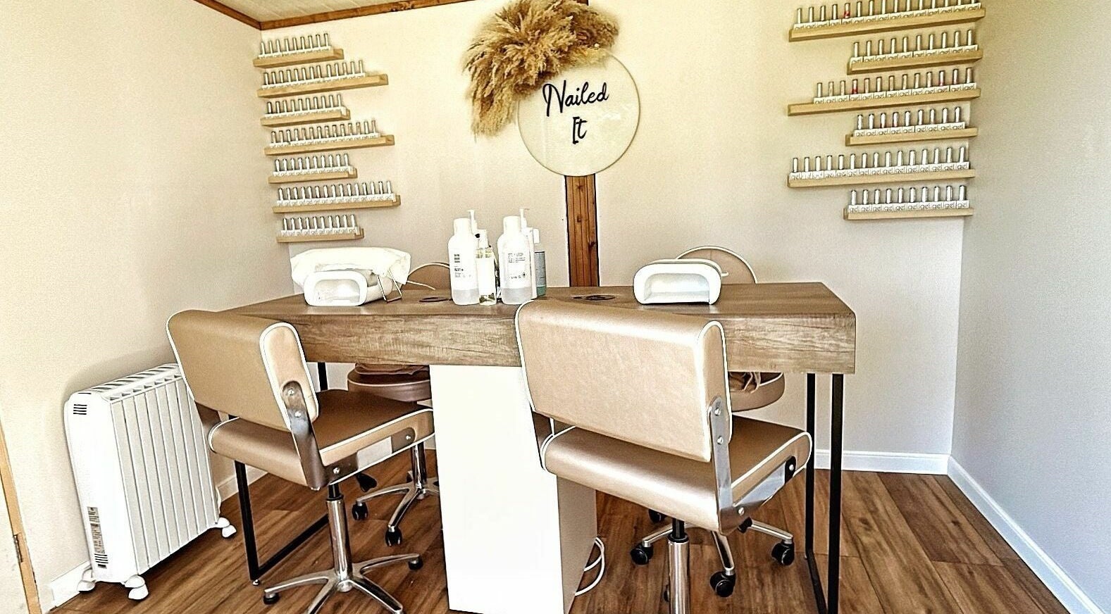 Elegant nail salon setup at The Cabin in Cossall, England, GB, featuring stylish chairs and nail products.