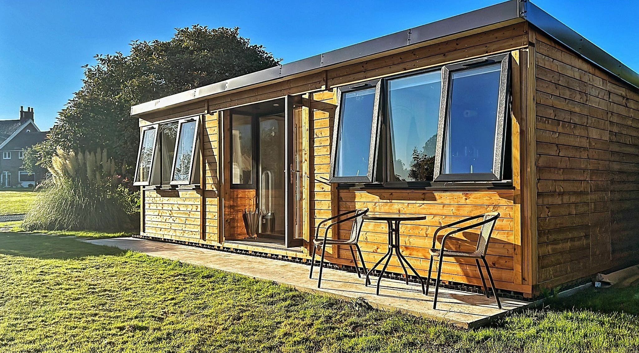 Charming wooden cabin exterior at The Cabin, Cossall, England, GB, perfect for a relaxing retreat.