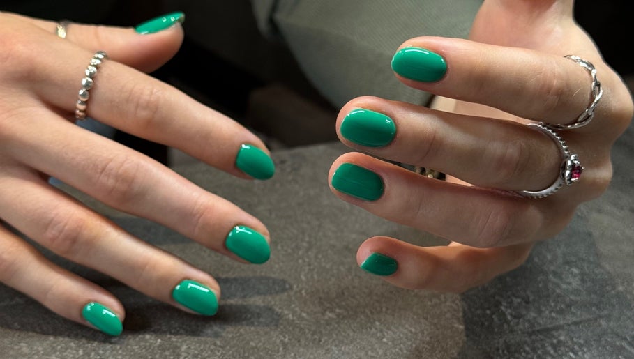 Emerald green nails at Irysha.beauty, Chichester, England, GB. Stunning manicure showcasing vibrant color.