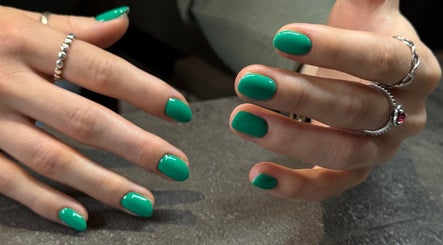 Emerald green nails at Irysha.beauty, Chichester, England, GB. Stunning manicure showcasing vibrant color.