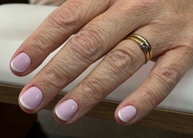 Manicured hands with pastel nails and ring at Irysha.beauty, Chichester, England, GB.