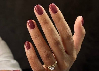 Stylish burgundy nails at Irysha.beauty in Chichester, England, GB, showcasing elegant nail art services.