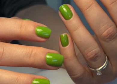 Vibrant green nails with a glossy finish from Irysha.beauty in Chichester, England, GB.