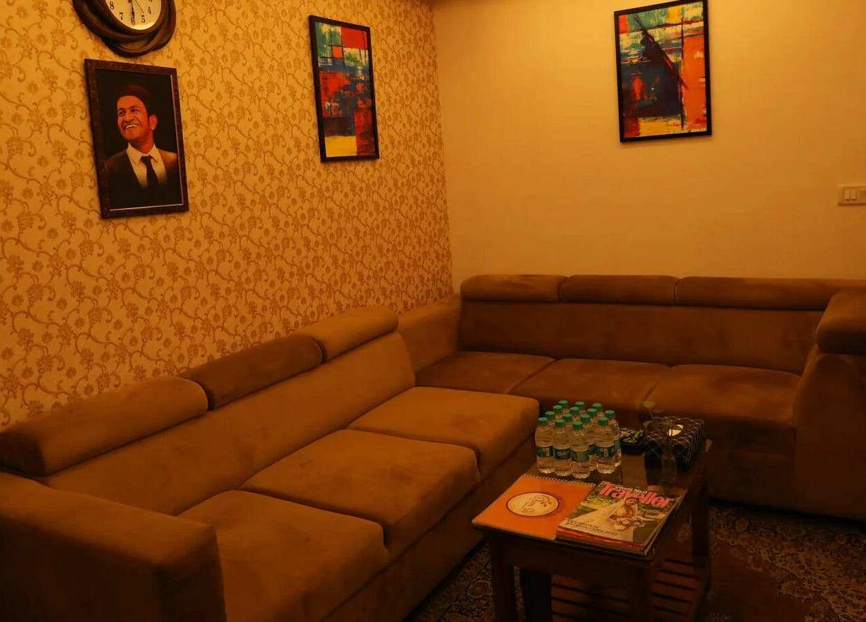 Inviting lounge at Dhara Spa - HSR Layout, Bengaluru, Karnataka, IN with plush sofas and elegant decor.