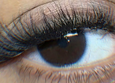 Closeup of an eye with voluminous lashes at Prestige Lash Lounge, Birmingham, England, GB.