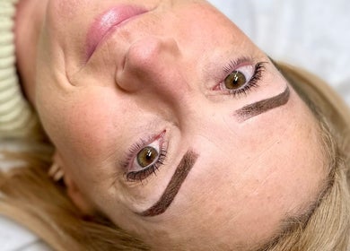 Close-up of a woman's freshly shaped eyebrows at Beyond Beauty & Brows Au, Hope Island, Queensland, AU.