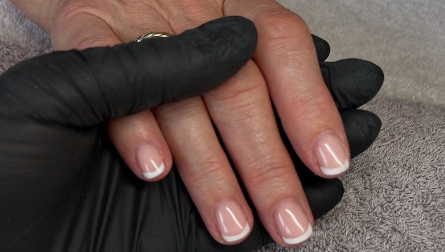 French manicure at Polished by Hannah, Burgess Hill, England. Perfect nails enhancing natural elegance.