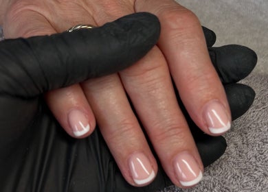 French manicure at Polished by Hannah, Burgess Hill, England. Perfect nails enhancing natural elegance.