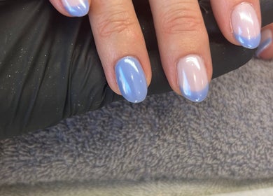 Elegant blue ombre manicure at Polished by Hannah in Burgess Hill, England, GB.