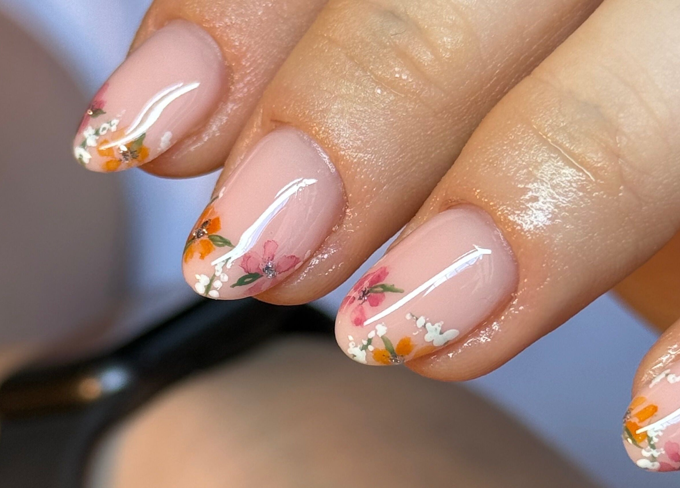 Beautiful floral nail art at BEAUTIMAX, Stockport, England, GB. Perfect for a sophisticated manicure.