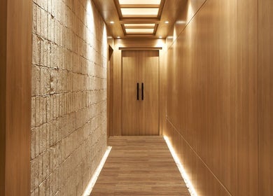 Elegant wooden hallway at Amansa Spa and Wellness Solo, Central Java, Central Java, ID, exudes calming ambiance.