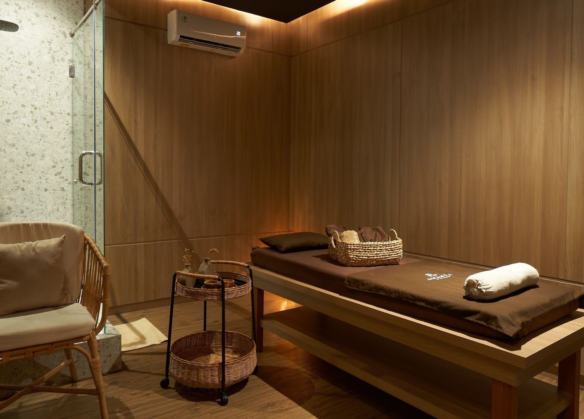 Calm therapy room at Amansa Spa and Wellness Solo, Central Java, Central Java, ID, featuring wood accents.