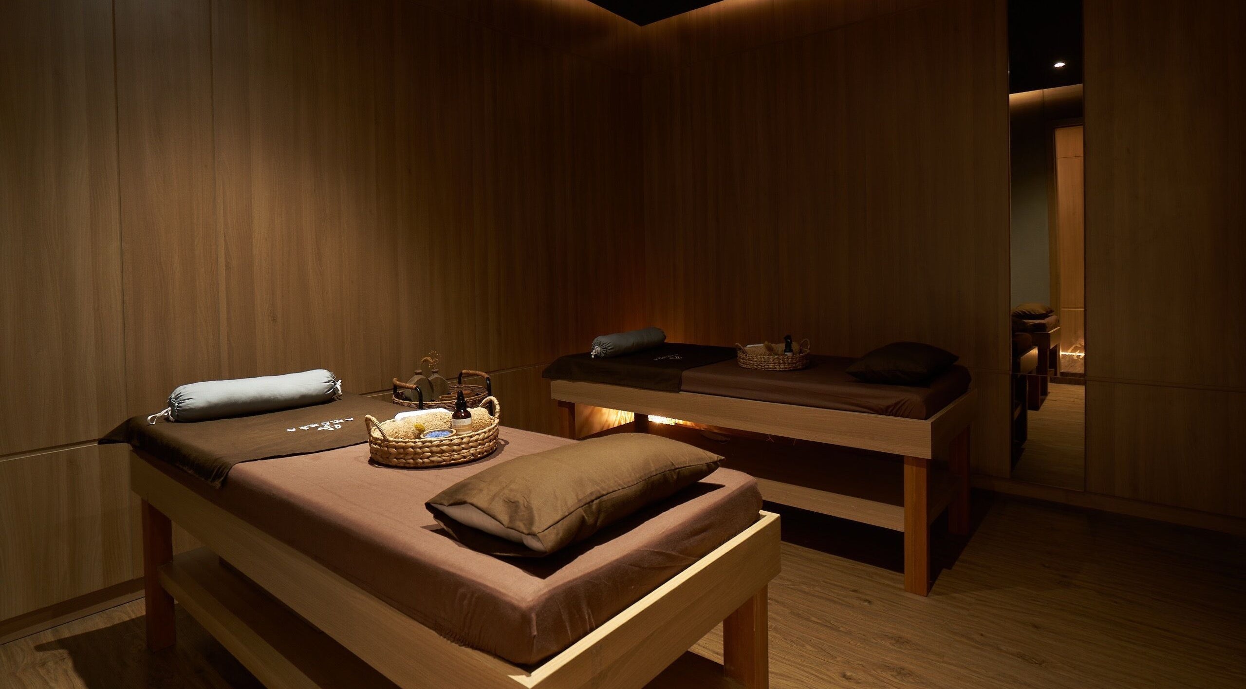 Relaxing treatment room at Amansa Spa and Wellness Solo, Central Java, Central Java, ID with massage tables.