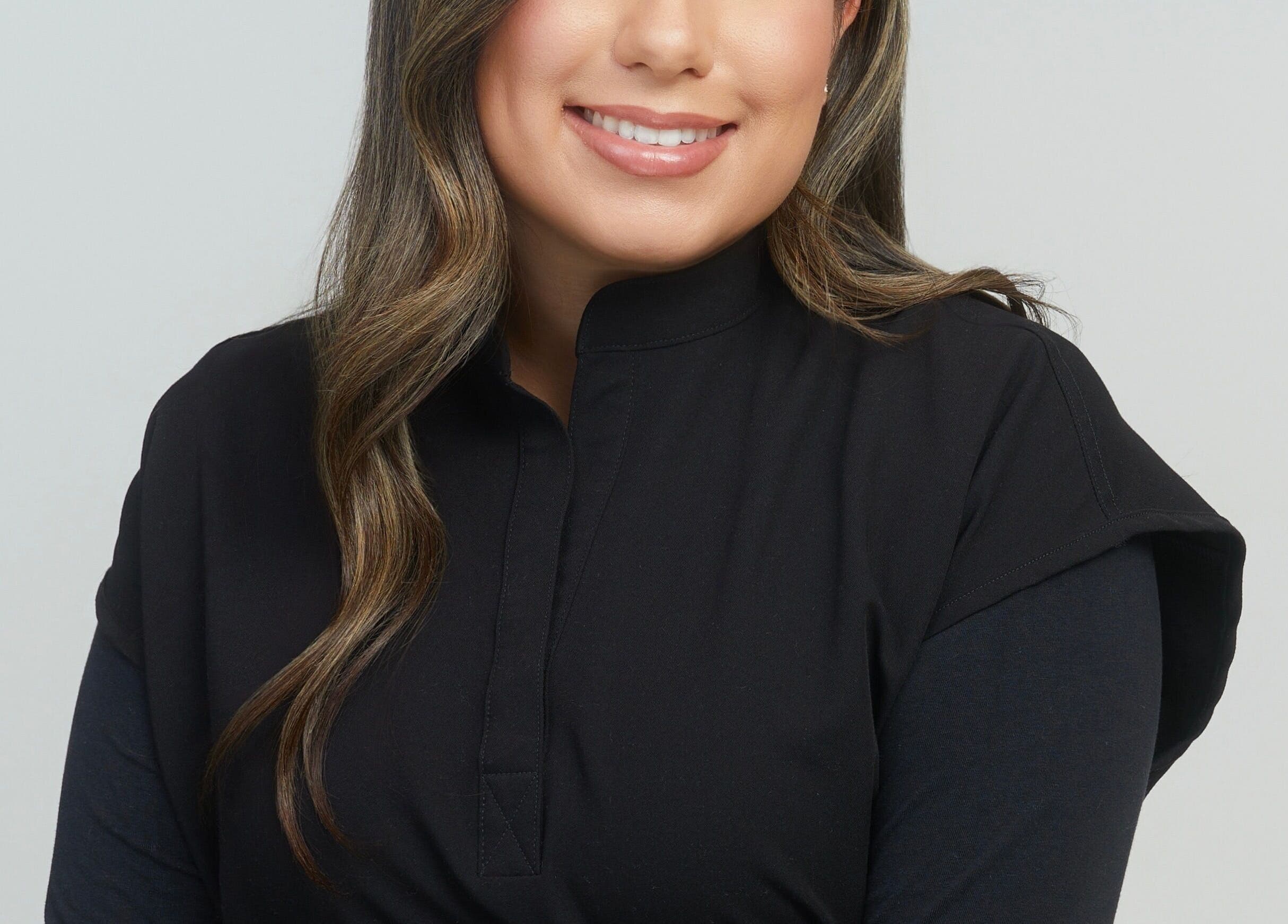 Professional at Casa Blanca Beauty in Vaughan, Ontario, CA with welcoming smile.