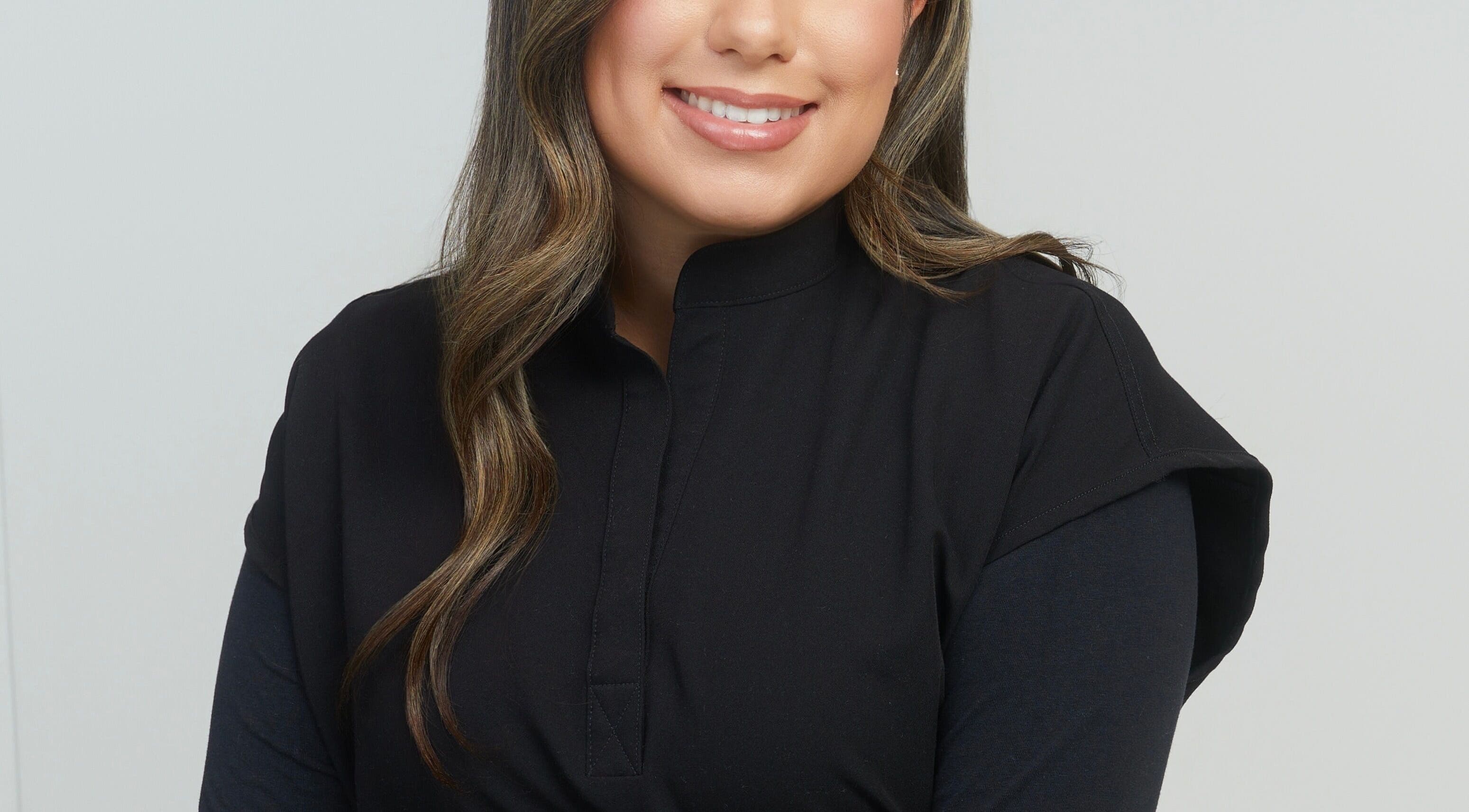 Professional at Casa Blanca Beauty in Vaughan, Ontario, CA with welcoming smile.