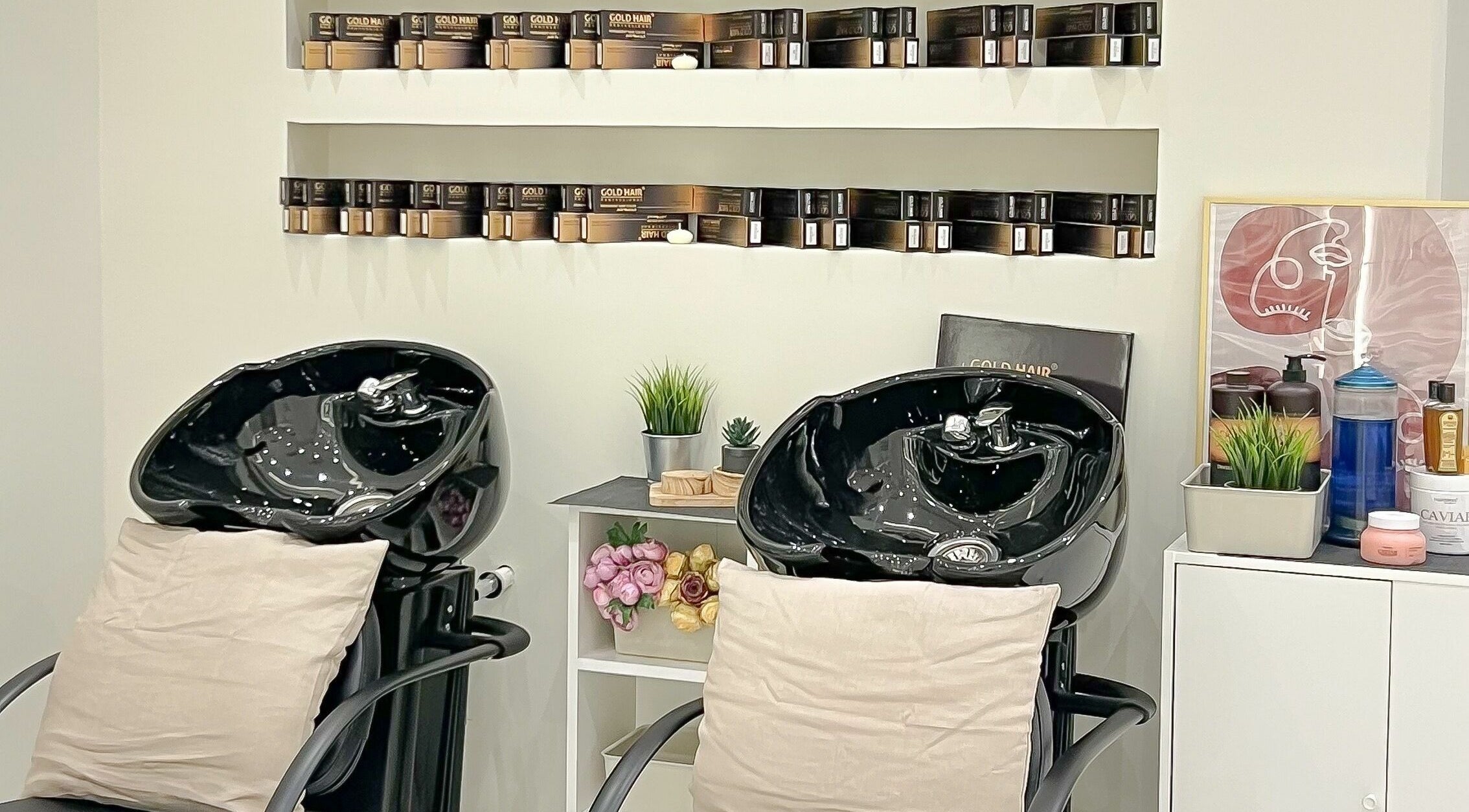 Elegant hair washing stations at Patonia Spa, Sharjah, Sharjah, AE, featuring plants and luxurious products.
