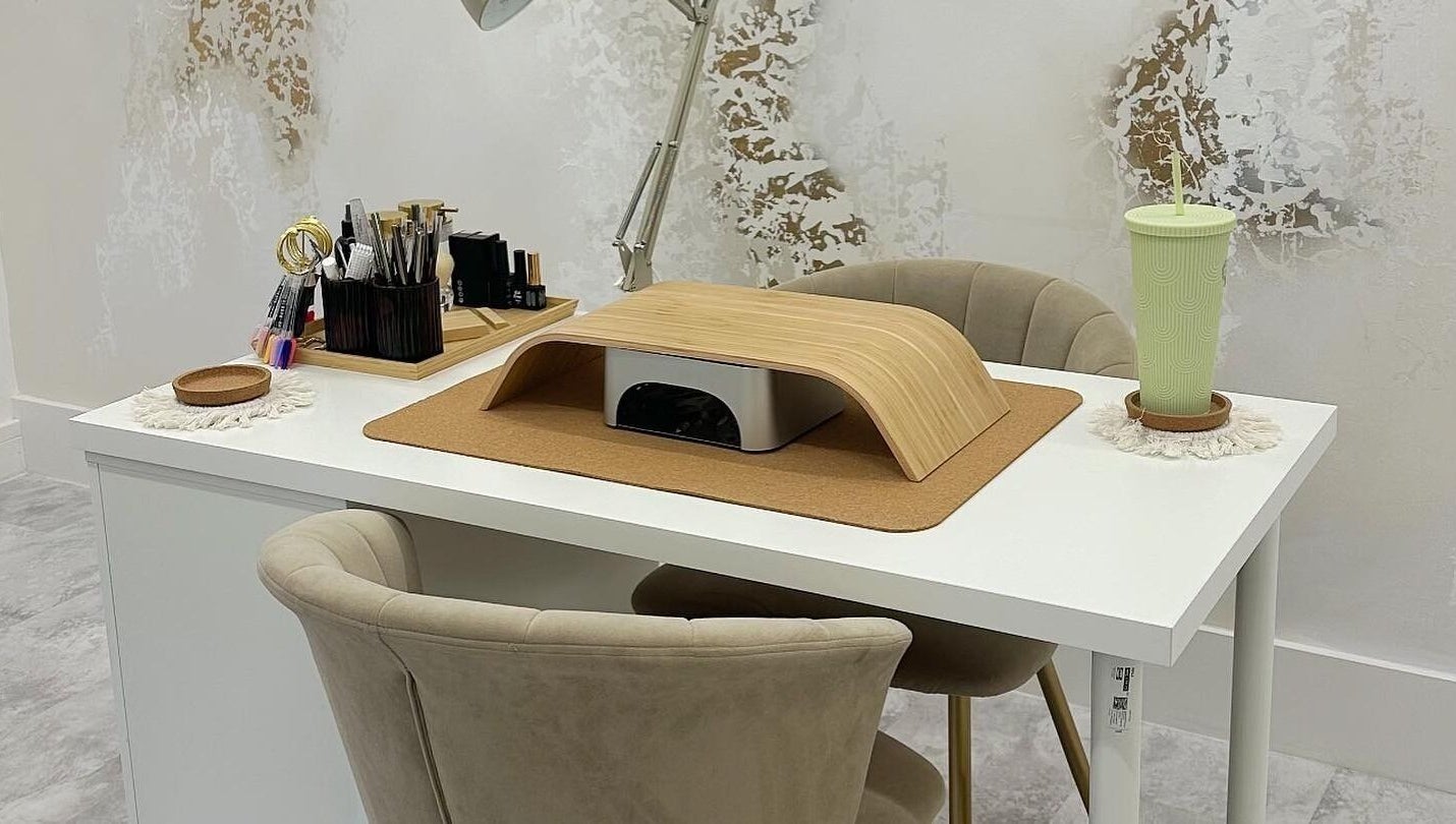Modern nail station at Heavenly Beauty, Ramsbottom, England, GB. Elegant setup with tools and cozy seating.