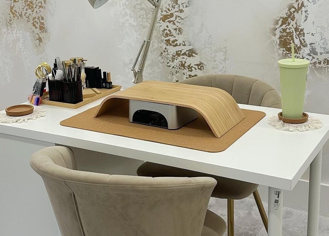 Modern nail station at Heavenly Beauty, Ramsbottom, England, GB. Elegant setup with tools and cozy seating.