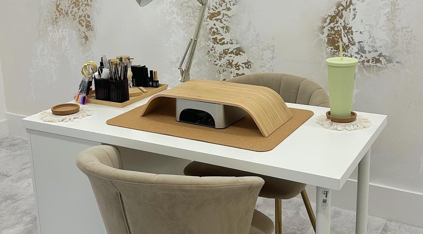 Modern nail station at Heavenly Beauty, Ramsbottom, England, GB. Elegant setup with tools and cozy seating.