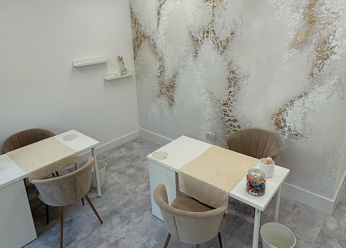 Elegant manicure stations at Heavenly Beauty, Ramsbottom, England, GB, showcasing modern decor and cozy seating.