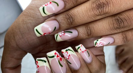 Floral nails at Pretty Nails By Sasha in Rockledge, Florida, US showcasing detailed hand-painted designs.