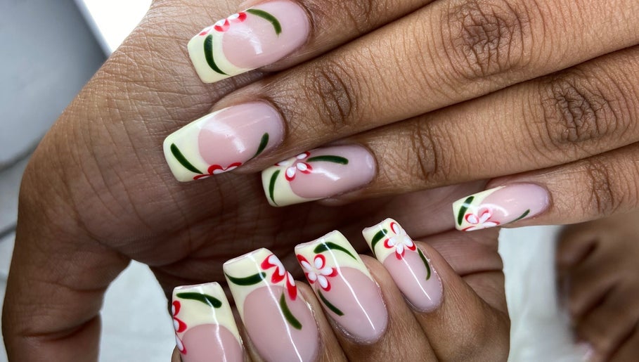Elegant floral nail art at Pretty Nails By Sasha in Rockledge, Florida, US, showcasing intricate design.