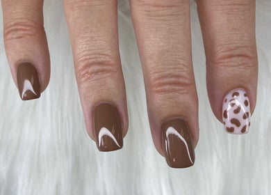Elegant brown and cream nail art at Pretty Nails By Sasha, Rockledge, Florida, US.