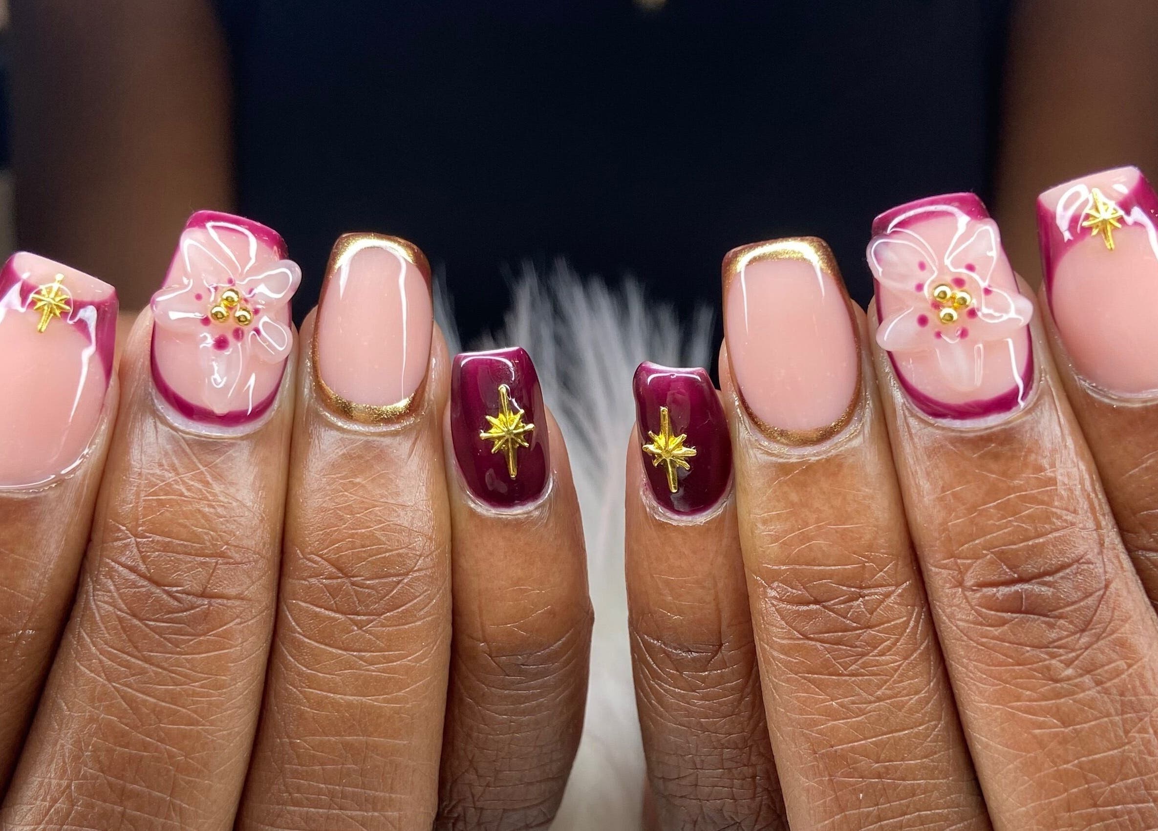 Stunning nail art featuring flowers and gold accents at Pretty Nails By Sasha, Rockledge, Florida, US.