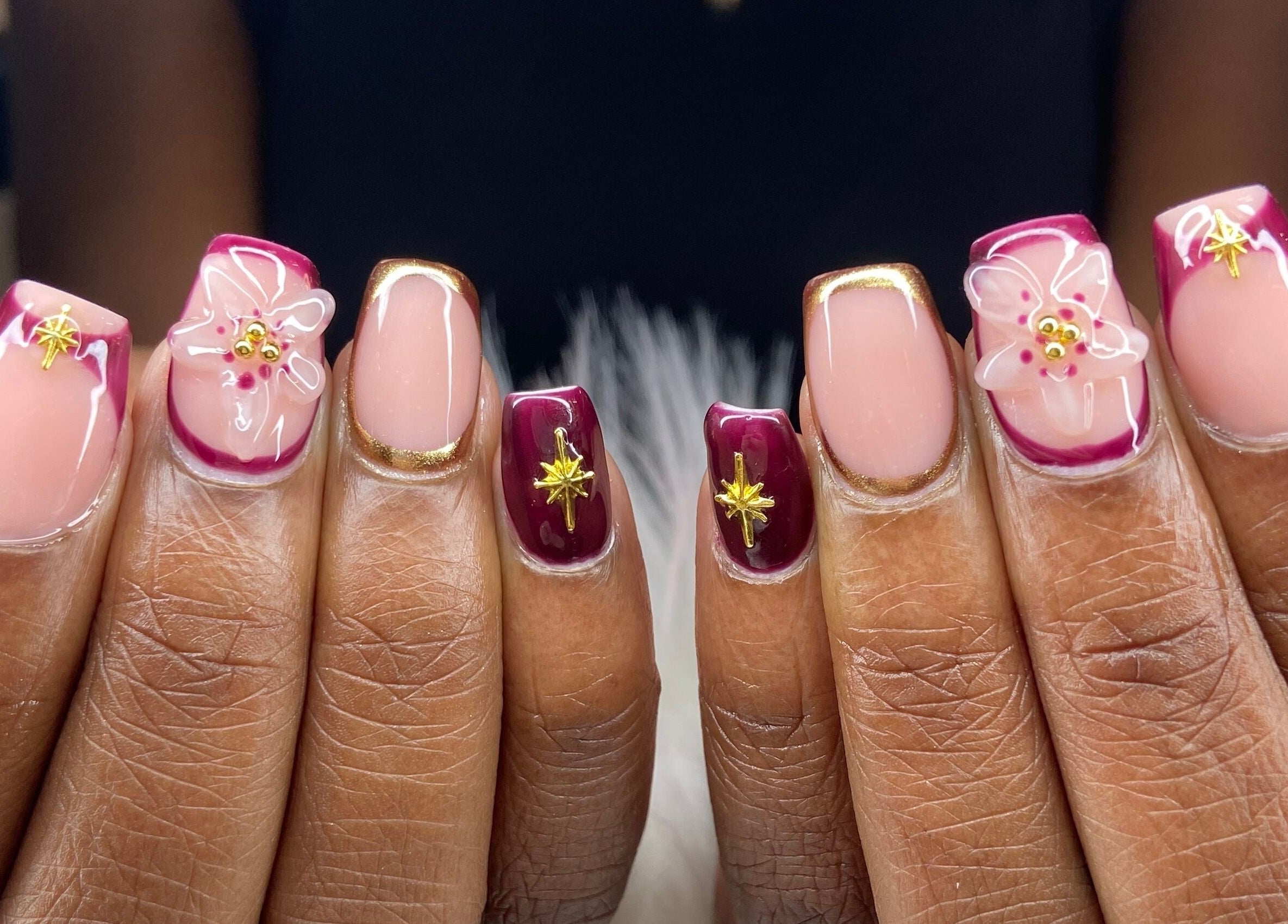 Stunning nail art featuring flowers and gold accents at Pretty Nails By Sasha, Rockledge, Florida, US.