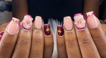 Stunning nail art featuring flowers and gold accents at Pretty Nails By Sasha, Rockledge, Florida, US.