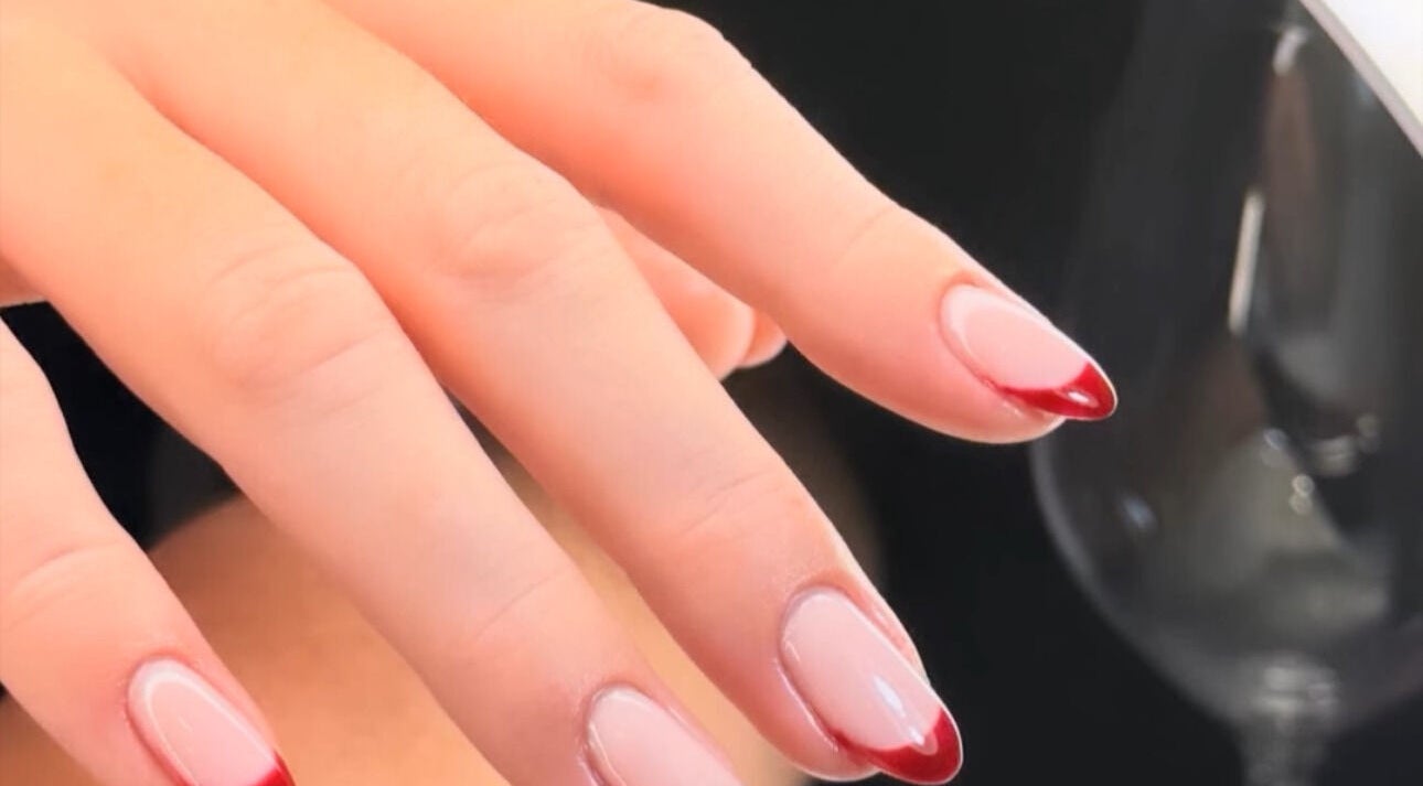 Elegant red-tipped nails at Organic Nail Care by Enji, Pelican Waters, Queensland, AU.