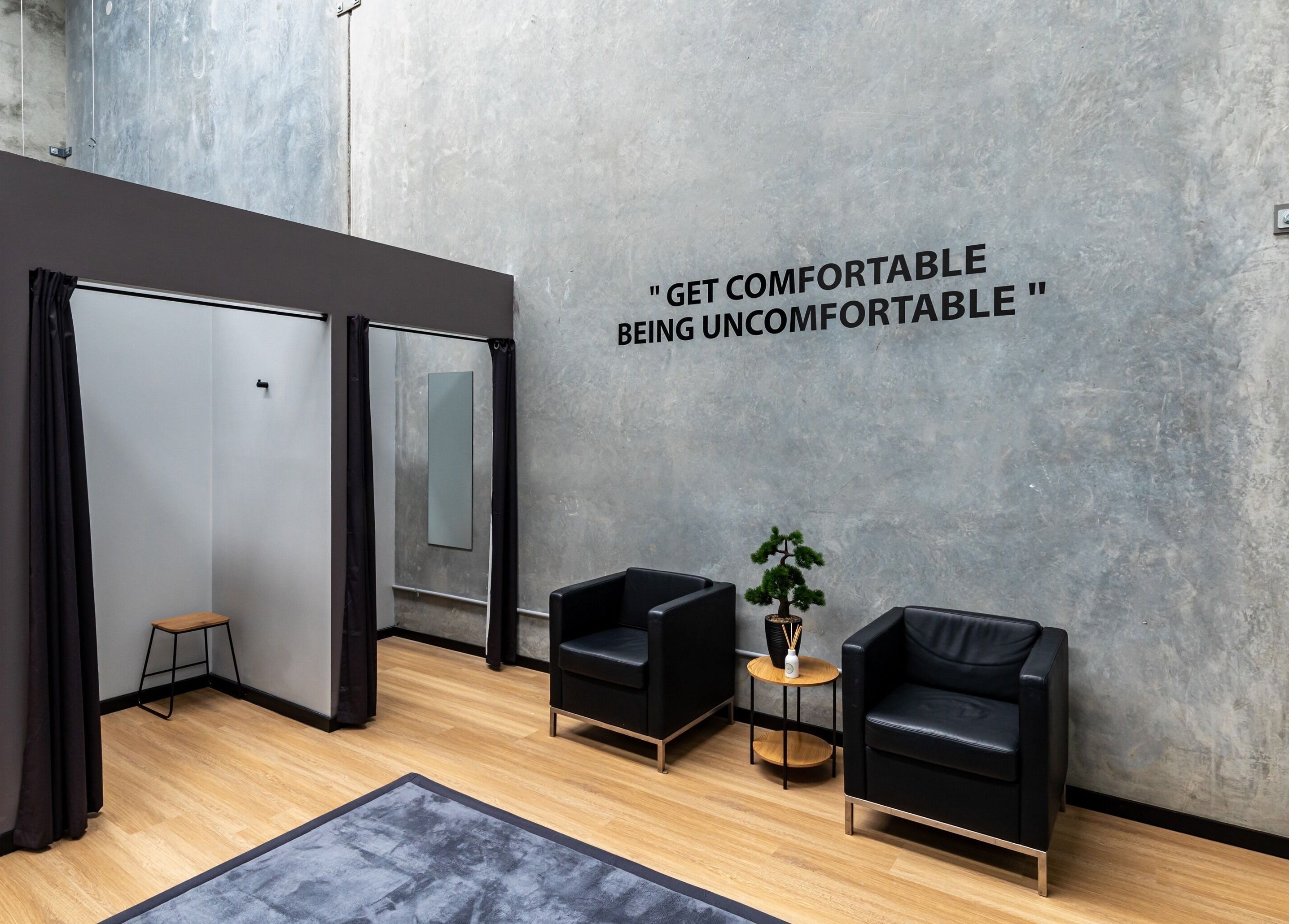 Modern relaxation area at XM Recovery, Rouse Hill, NSW, AU with stylish decor and motivational quote.