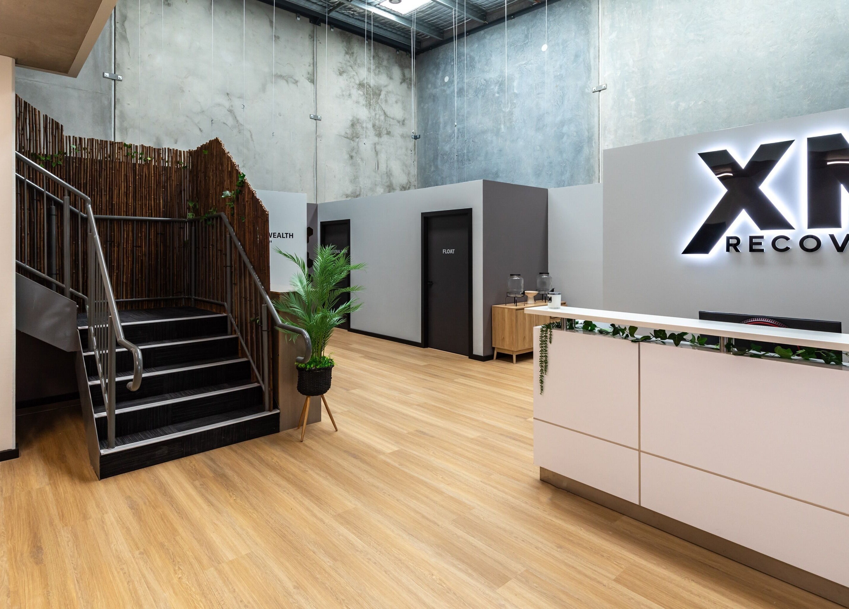 Entrance of XM Recovery clinic in Rouse Hill, New South Wales, AU, featuring sleek interior design.