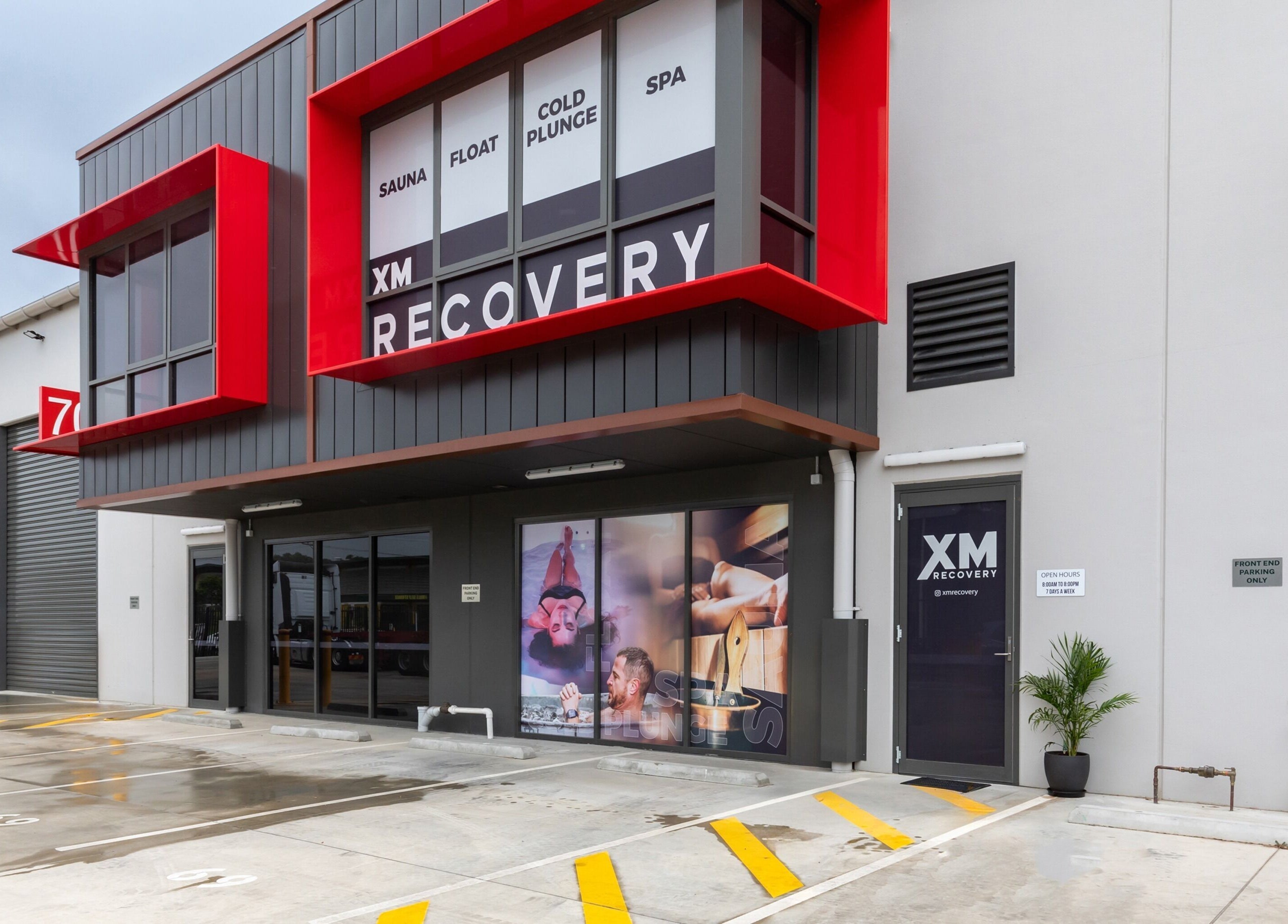 Entrance of XM Recovery, a modern facility in Rouse Hill, New South Wales, AU offering spa and wellness services.
