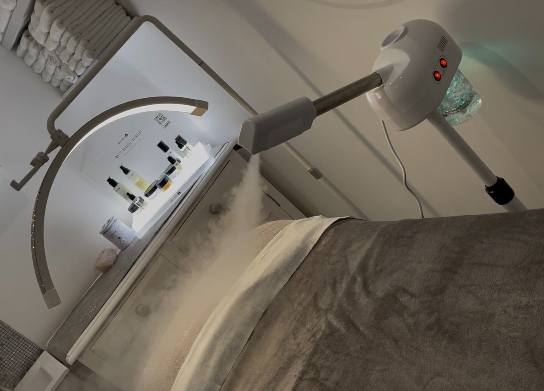 Treatment room at Moore Beauty in Knaphill, England, GB featuring a steam therapy setup.