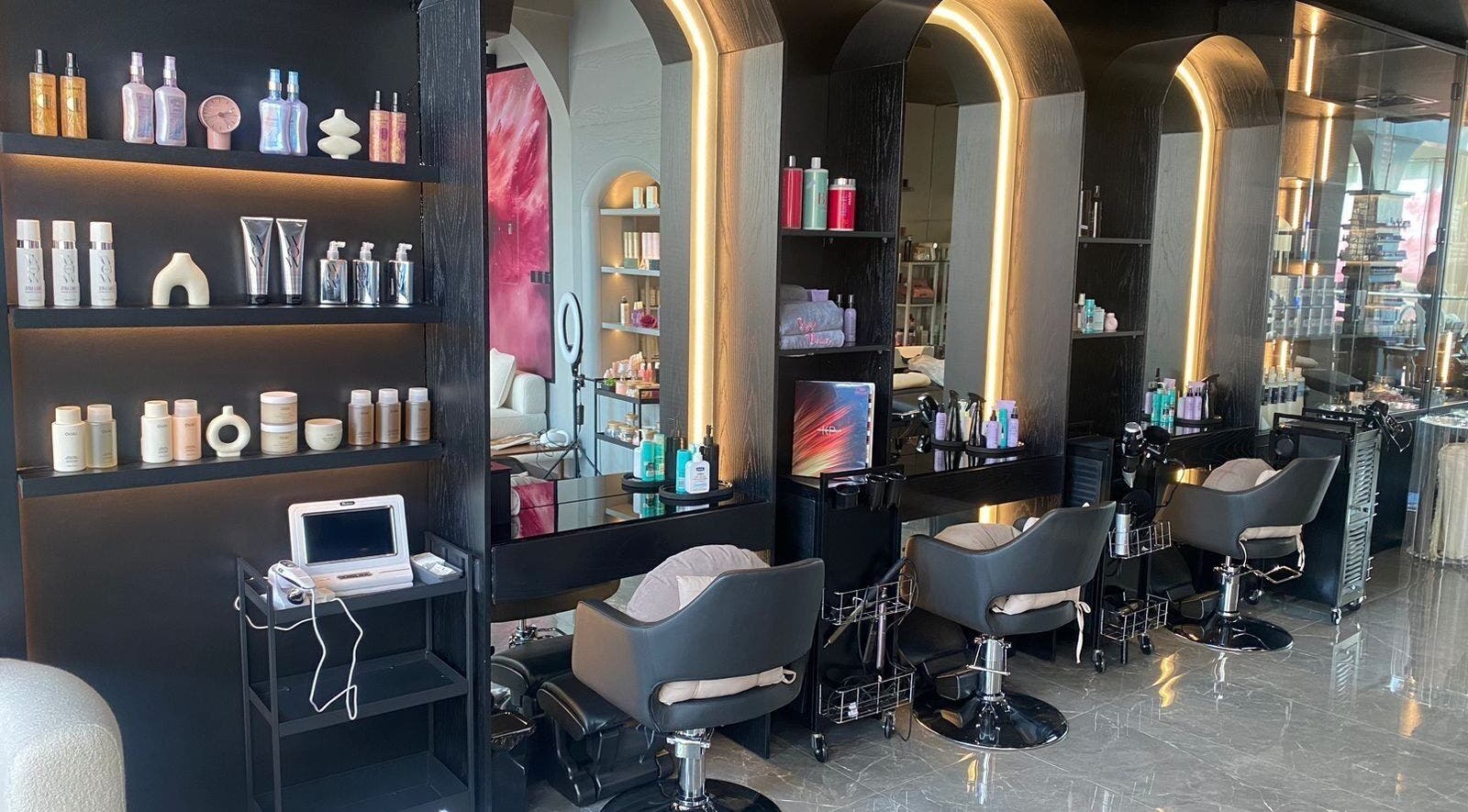 Elegant salon interior with styling stations at Quick Beauty Salon, Al Khobar, Eastern Province, SA.