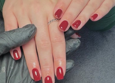 Elegant red nails at By Kadie, featuring expert manicure in Throckley, England, GB.